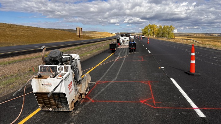 Flat saw cutting and layout on a highway concrete repair